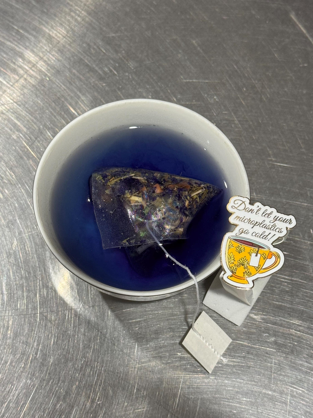 Don’t let your microplastics go cold! - Original Design Enamel Pin